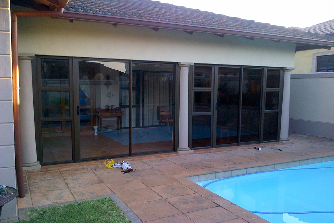 Poolside Sliding Doors by Glass & Aluminium Craft